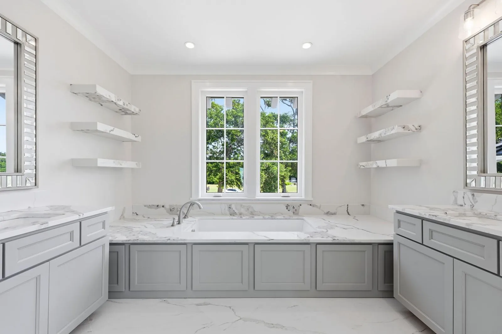 Bath with soaking tub and twin vanities