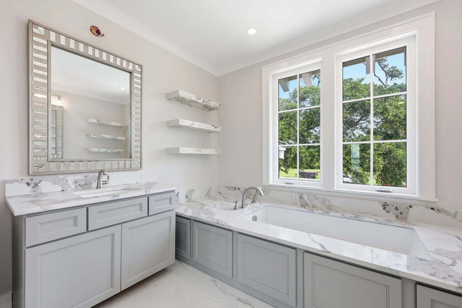 Soaking tub with stone surround